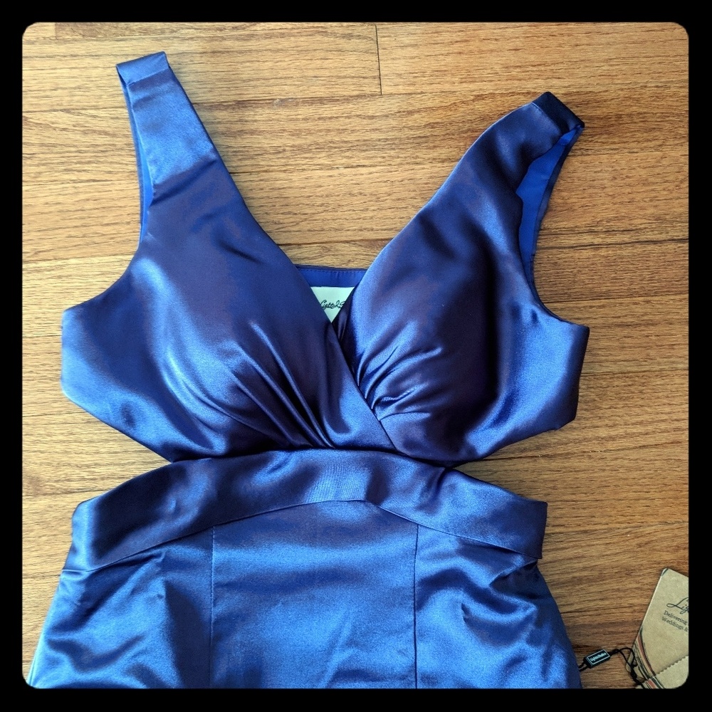 Purple cocktail dress with side cutouts